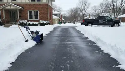 Cleared Milwaukee driveway after professional snow removal by Chop Chop Landscaping